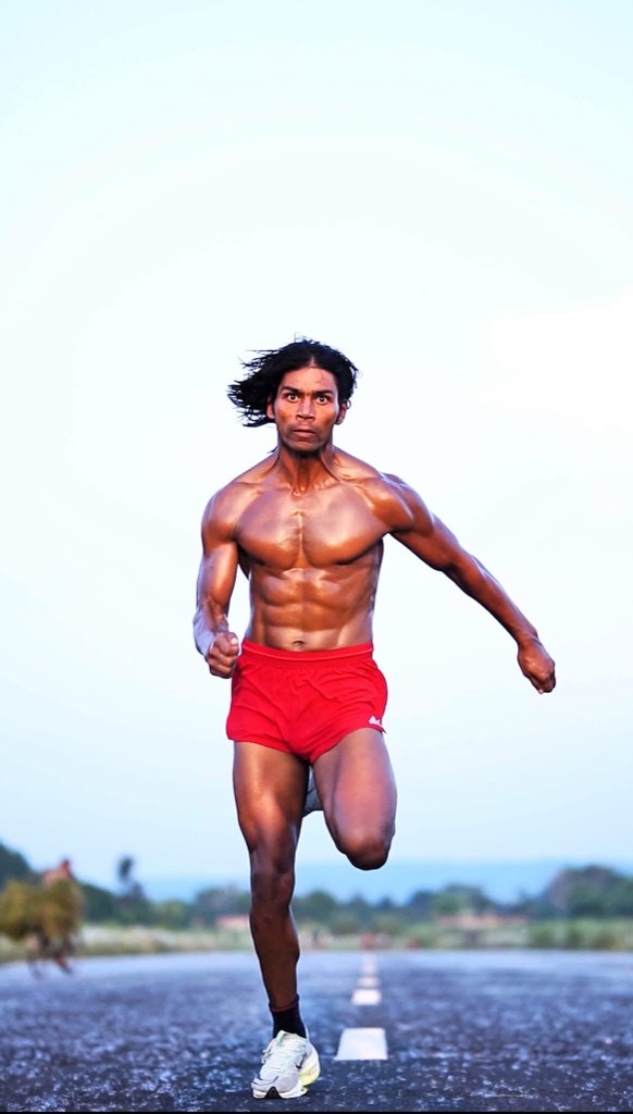 Raja Yadav sprinting on an open road